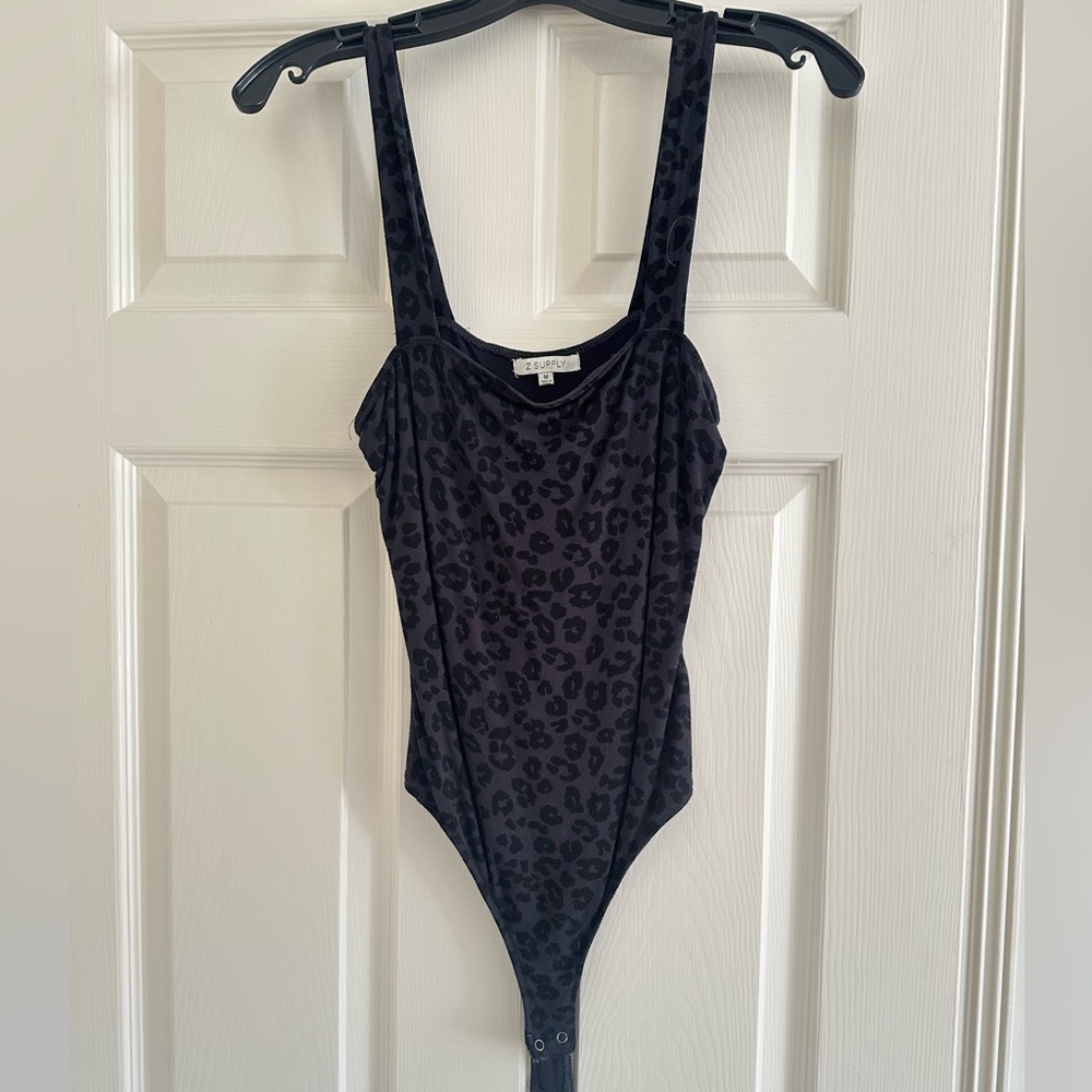 Cheetah print bodysuit NEVER WORN